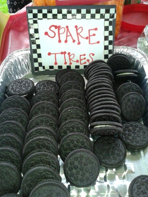 there are many oreo cookies on display at the table with a sign that says spare tires