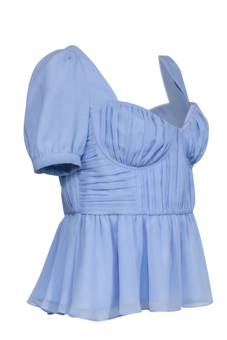 Designed with a feminine peplum silhouette in a light blue, this whimsical Self-Portrait top can be worn to various events during the day. The ruched pleated sweetheart neckline adds some feminine flare to this spring look. Keep it casual by pairing with your favorite jeans and a kitten heel! Size 10 100% Polyester Back zipper w/ tie back Sweetheart Neckline Short puff sleeve Ruched bodice Peplum Bust 36" Waist 33" Shoulder to hem 23" Sleeve length10.5" French Girl Chic, Portrait Lighting, Short Puff Sleeve, Spring Look, Chic Shop, Buy Shoes Online, Ruched Bodice, Spring Looks, French Girl