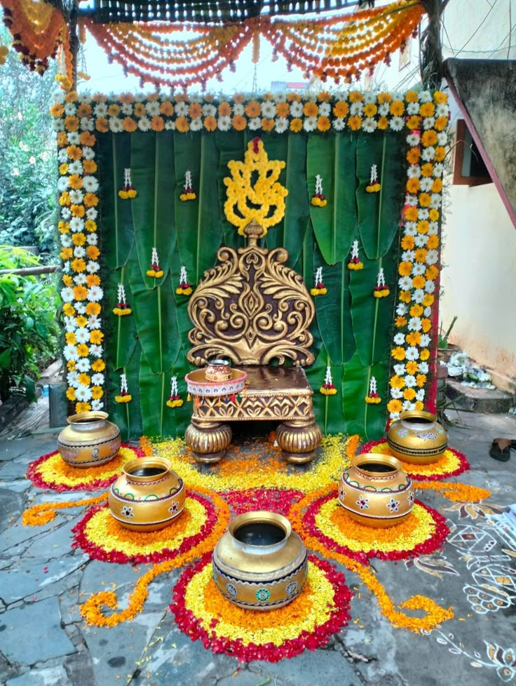 a decorated stage with pots and decorations