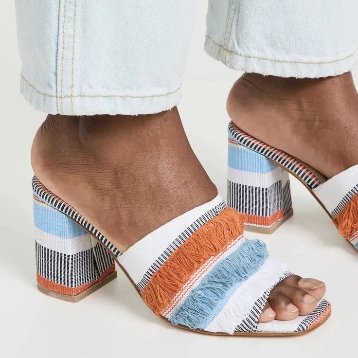 Modern Mules With Woven Sole, Chic Woven Mules For Beach, Chic Woven Mules For The Beach, Spring Vacation Woven Mules, Bohemian Spring Mules, Chic Mules With Woven Sole And Block Heel, Casual Summer Woven Mules, Chic Summer Mules For Vacation, Woven Mules For Summer