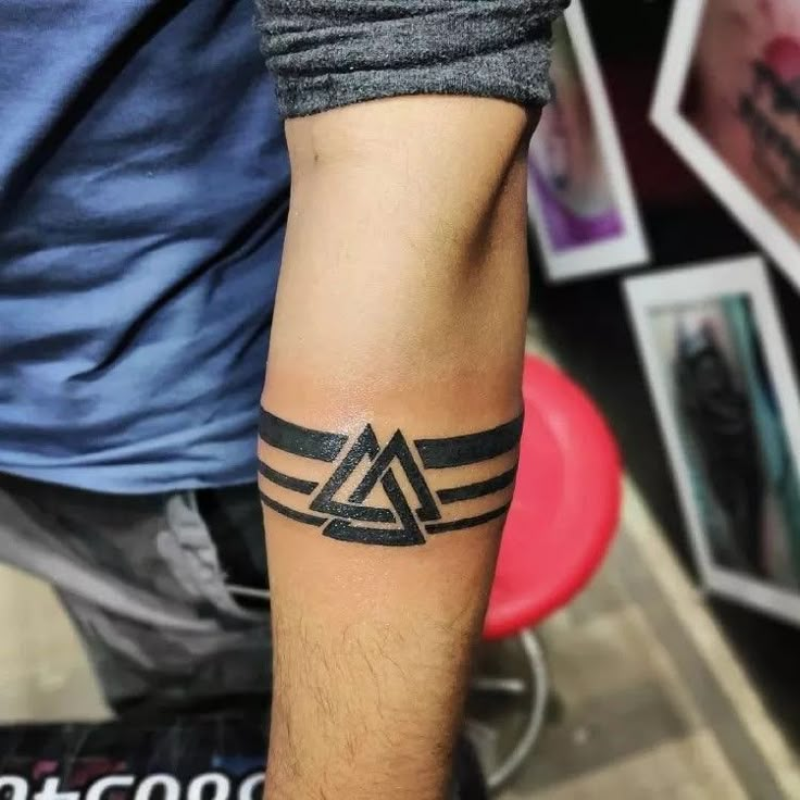 Armband forearm tattoo. Hand Band Tattoo, Wrist Band Tattoo, Armband Tattoos For Men, Band Tattoos For Men, Tattoo Band, Brother Tattoos, Hand Band, Triangle Tattoos, Forearm Band Tattoos