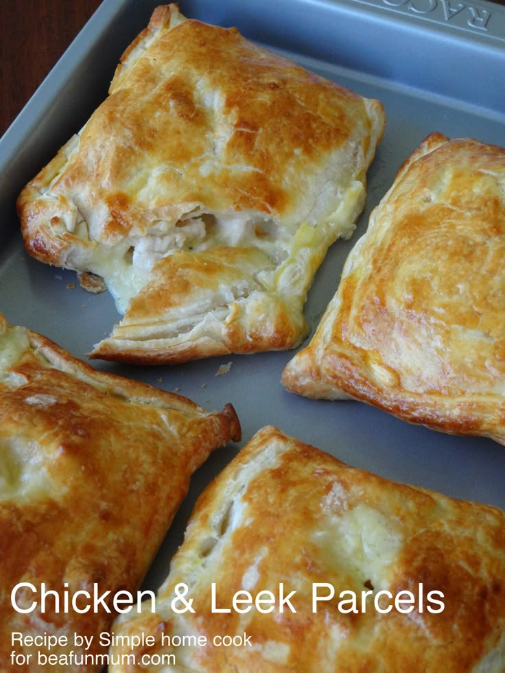 four chicken and leek parcels in a baking pan