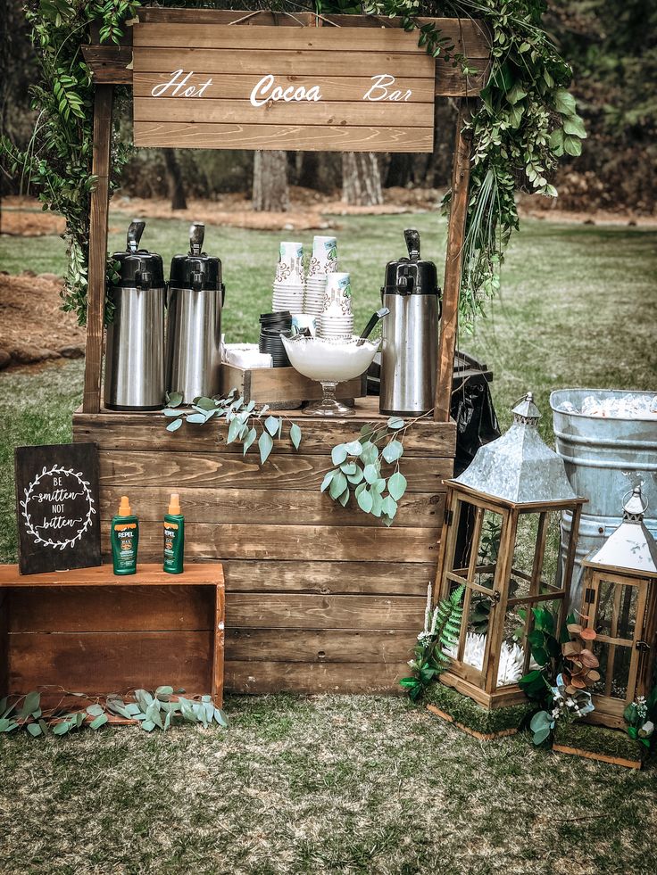 an outdoor bar set up in the grass