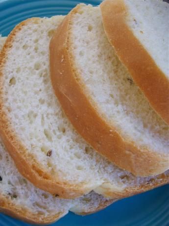 three slices of white bread sitting on top of a blue plate