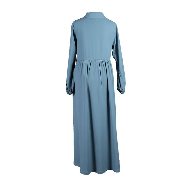 This minimalistic loose-waist abaya with a classic flowy shape is great for everyday wear or dressed up for special occasions! It's light, comfortable, and the best part? It's made-to-order to ensure it suits you perfectly. At Basma Boutique, we custom make every product for every client, and we can even customize it however you like. Want it a unique colour? A different fabric? Or shorter (even turn it into a tunic)? We can do all that and more. Once you place your order and provide your contac Elegant Long Sleeve Plain Maxi Dress, Modest Flowy Maxi Dress, Elegant Spring Abaya With Modesty Panel, Long Dress With Modesty Panel, Modest Solid Color Maxi Dress, Long Sleeve Maxi Dress For Daywear, Modest Long Sleeve Plain Maxi Dress, Elegant Long Maxi Dress With Modesty Panel, Solid Color Long Maxi Dress For Daywear