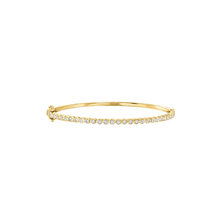 Curate a bracelet collection that reflects your distinct style with our timeless diamond bezel bangle. Adorned with round diamonds elegantly set in squared bezels, it exudes classic charm. Available in 14k Yellow Gold, White Gold or Rose Gold Diamond Color: F/G / Diamond Clarity: VS1 Total Carat Weight: 1.15 ct Closure: Snap-Double Lock Clasp 4mm x 2mm 7 inch length Made to order. Lead time is 4-6 weeks. Benefits of Solid 14k Gold Jewelry Most loved for its durability and longevity Can be worn d Elegant Diamond Gold Bracelet With Bezel Setting, Elegant Gold Bracelet With Diamond Bezel Setting, Yellow Gold Diamond Bangle With Bezel Setting, Yellow Gold Bangle Diamond Bracelet With Bezel Setting, Yellow Gold Diamond Bangle Bracelet With Bezel Setting, Luxury Round Bangle With Bezel Setting, Classic White Gold Bangle With Single Diamond, Classic Bangle With Single Diamond For Anniversary, Classic Single Diamond Bangle For Anniversary