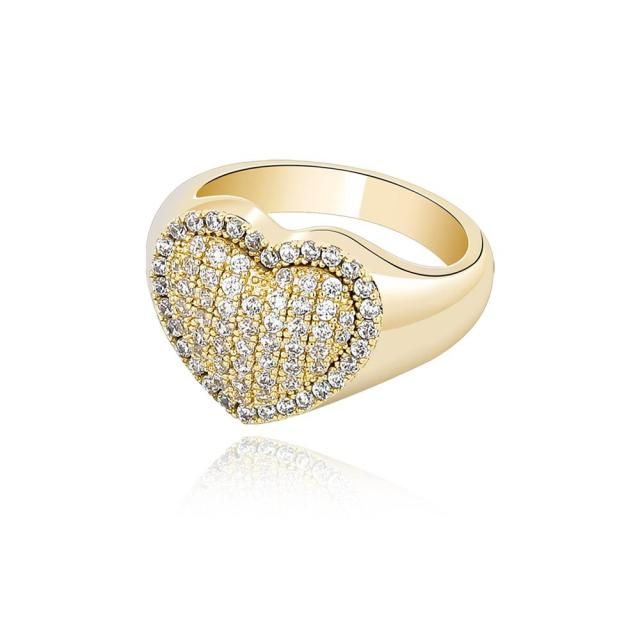 Iced out heart design statement ring with AAA cubic zirconia pave inlay. A stunning piece that really shines! Available in rose gold, gold, and silver colors. Details Item Type: Fashion Rings Metal Type: Copper+Gold Plated Size: 15mm*23mm Main Stone: AAA Cubic Zirconia Accessory Stone: AAA Cubic Zirconia Metal Engagement Rings, Mixed Metal Engagement Rings, Rock Rings, 50th Bday, Diamond Ice, Diamond Heart Ring, Heart Shaped Rings, Clover Necklace, Ring Shapes