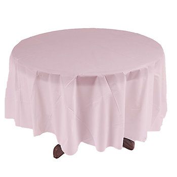 a round table covered in pink cloth