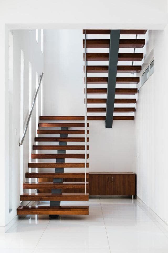 the stairs are made of wood and metal