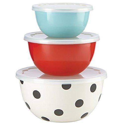 three bowls stacked on top of each other with polka dot designs in different colors and sizes