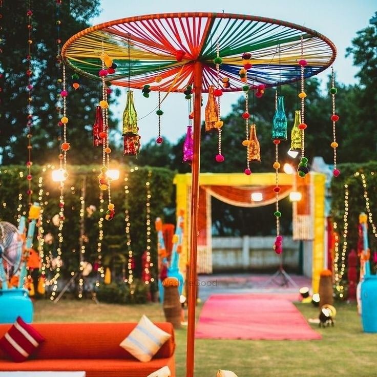 an outdoor area with colorful decorations and lights