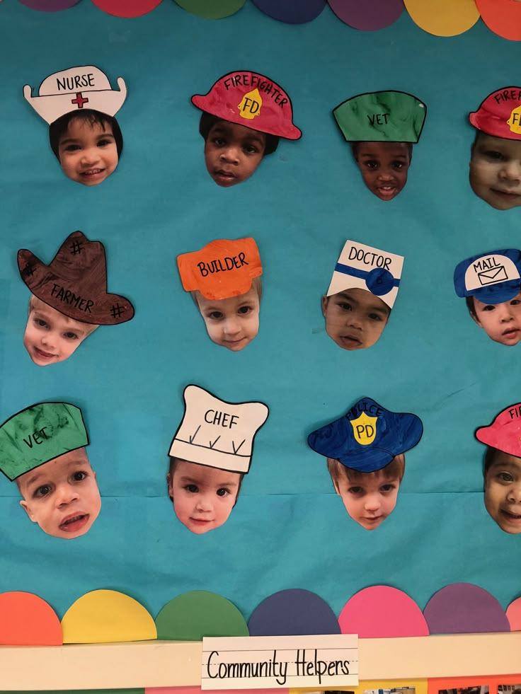 children's hats with names and pictures on them are pinned to a bulletin board