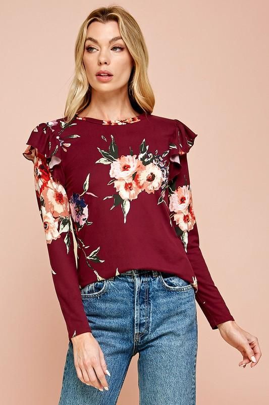 Burgundy top with a gorgeous floral print with ruffle sleeve accents. 87% Polyester 13% Spandex Spring Blouse With Ruffle Hem And Crew Neck, Ruffle Sleeve Printed Top For Brunch, Spring Floral Print Tops With Flutter Sleeve, Fitted Blouse With Floral Print And Ruffle Sleeves, Chic Flutter Sleeve Floral Print Tops, Flutter Sleeve Floral Print Top For Brunch, Trendy Ruffle Sleeve Tops For Brunch, Fall Floral Print Top With Flutter Sleeves, Floral Print Flutter Sleeve Tops For Brunch