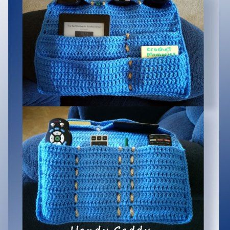 there is a blue crochet bag with buttons on it and the bottom has a video game controller in it