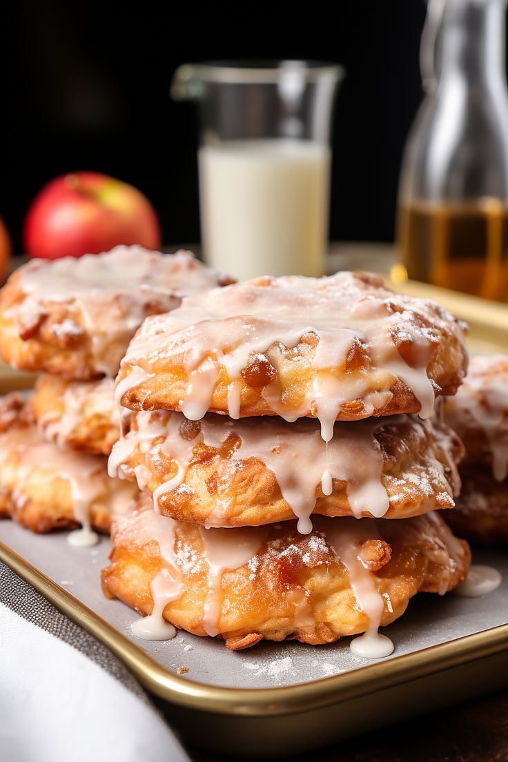 there are several donuts on the plate with icing