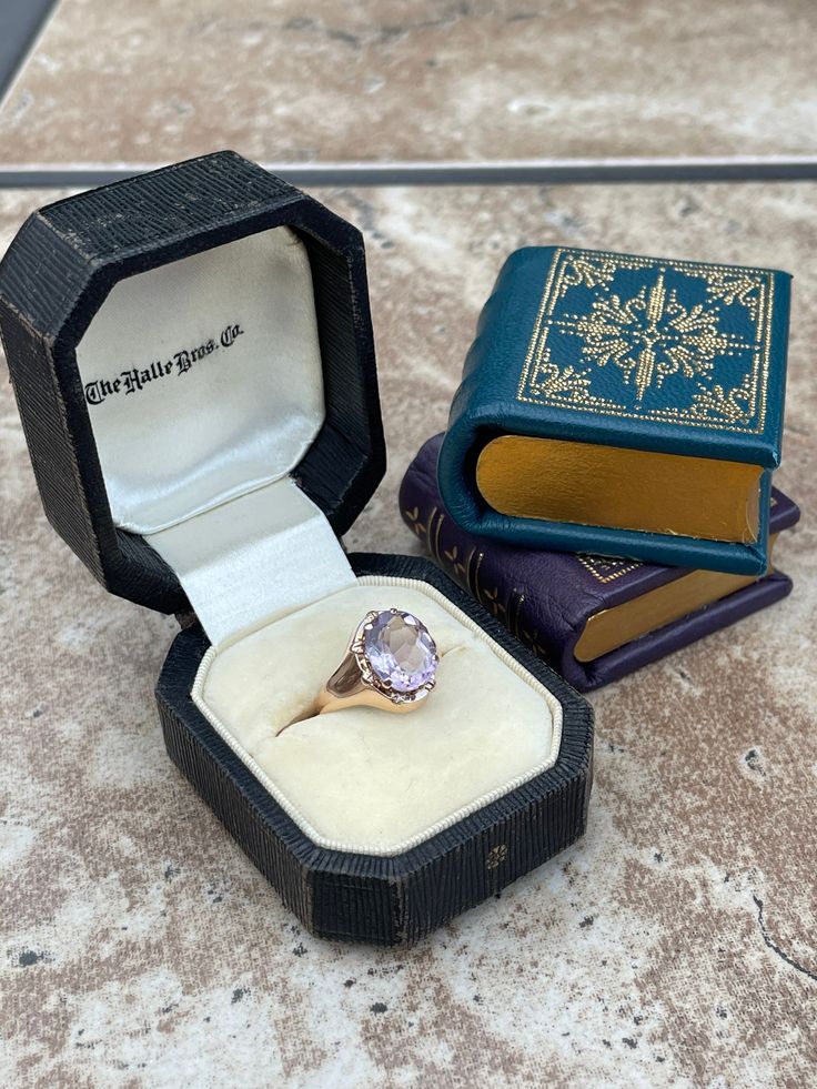 This ring is a one of a kind with lovely a oval faceted Rose de France Amethyst set in a multi prong mounting with miniature leaf details around it. The stone measures 10.25X8.50X5.00 millimeters, the ring is in 14 karat rose gold and is currently a size 5.25 and could easily go up in size or down within reason. The ring weighs a total of 2.60 grams.  Condition details: the prongs are worn and two prong tips are gone, the stone has some chips. There are signs of previous repair but all around th Formal Oval Signet Ring With Rose Cut Diamonds, Classic Oval Amethyst Ring Collectible, Victorian Oval Rings For Formal Occasions, Oval Heirloom Diamond Ring Gift, Oval Amethyst Signet Ring For Formal Occasions, Antique Oval Solitaire Jewelry, Classic Marquise Topaz Ring For Gift, Antique Marquise Rings For Gift, Heirloom Oval Faceted Ring