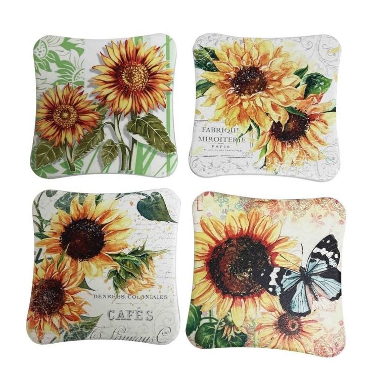 four sunflower coasters with butterflies on them