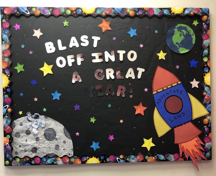 a bulletin board that says blast off into a great year with space and stars on it