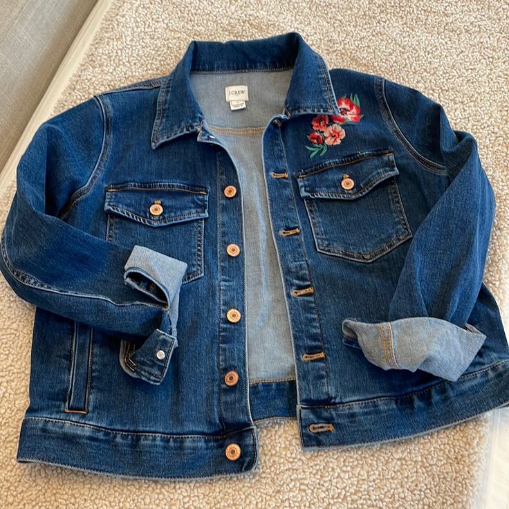 Fun J Crew Denim Jacket Size Med Never Worn. Has Pretty Flower Embroidery On Front. Spring Embroidered Medium Wash Outerwear, Spring Embroidered Outerwear In Medium Wash, Denim Blue Jacket With Floral Embroidery For Fall, Denim Blue Floral Embroidered Denim Jacket For Fall, Denim Blue Floral Embroidered Outerwear For Fall, Embroidered Dark Wash Denim Jacket For Spring, Spring Embroidered Dark Wash Denim Jacket, Embroidered Denim Button-up Jacket For Spring, Embroidered Button-up Denim Jacket For Spring