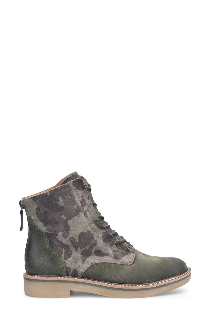 Crafted with soft Italian leather and set on a memory foam footbed, this boot modernizes the combat cut with hidden eyelets and a sturdy sole. 1 1/4" heel Leather upper/textile lining/synthetic sole Imported Green Leather Ankle Moto Boots, Green Leather Boots With Lug Sole, Green Ankle Boots With Lug Sole, Green Leather Boots For Fall, Khaki Leather Combat Boots For Outdoor, Leather Military Combat Boots With Round Toe, Military Leather Combat Boots With Round Toe, Khaki Leather High-top Boots, Khaki High-top Leather Boots