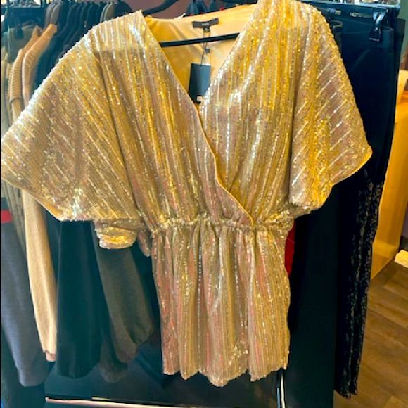 Brand New Sequin Gold And Silver Dress. Criss Cross Front. For Someone 5’4 And Up. V-neck Shimmer Mini Dress For Spring, Spring V-neck Shimmer Mini Dress, V-neck Shimmer Dresses For Spring, Chic Metallic Dresses For Festive Occasions, Chic Metallic Festive Dresses, Chic Festive Metallic Dresses, Gold Shimmer Dress For Holiday Party, Spring Festive Metallic Dress, Champagne V-neck Sequin Dress For Night Out