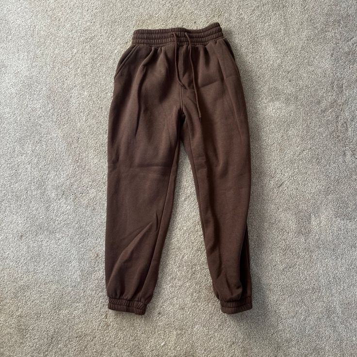 Free Haven Brown Jogger Style Sweatpants Size Medium Never Worn Baggy Brown Pants For Loungewear, Casual Brown Tapered Leg Pants For Loungewear, Brown Tapered Leg Pants For Loungewear, Brown Tapered Leg Loungewear Pants, Brown Joggers With Elastic Waistband For Loungewear, Brown Baggy Bottoms For Loungewear, Brown Joggers With Pockets For Loungewear, Casual Brown Sweatpants With Elastic Waistband, Brown Tapered Leg Bottoms For Loungewear