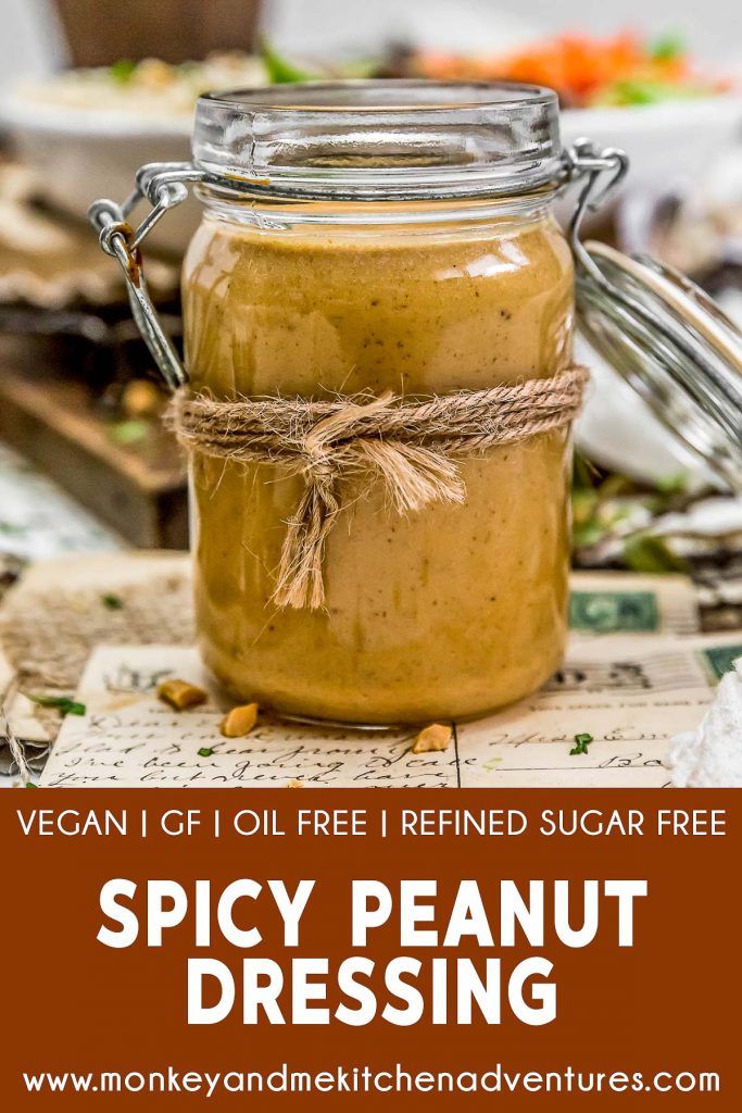 a mason jar filled with spicy peanut dressing