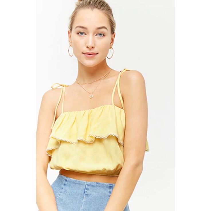 Yellow Lace Ruffle Flounce Cami Crop Top Size Medium New With Tags From Forever 21 Light Yellow Ties At The Shoulder Elastic Band At Bottom Lace Detailing Measurements Provided Upon Request Flirty Ruffled Crop Top For Spring, Spring Flirty Ruffled Crop Top, Flirty Ruffled Crop Top For Brunch, Spring Chic Crop Top With Ruffle Hem, Chic Spring Crop Top With Ruffle Hem, Trendy Ruffled Tops For Summer, Trendy Forever 21 Ruffled Tops, Summer Cami Blouse With Ruffles, Feminine Summer Crop Top With Ruffled Straps