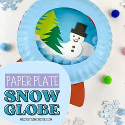 a paper plate snow globe with a snowman on it