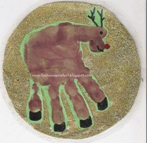 a handprint is shown in the shape of a deer's paw on a round surface