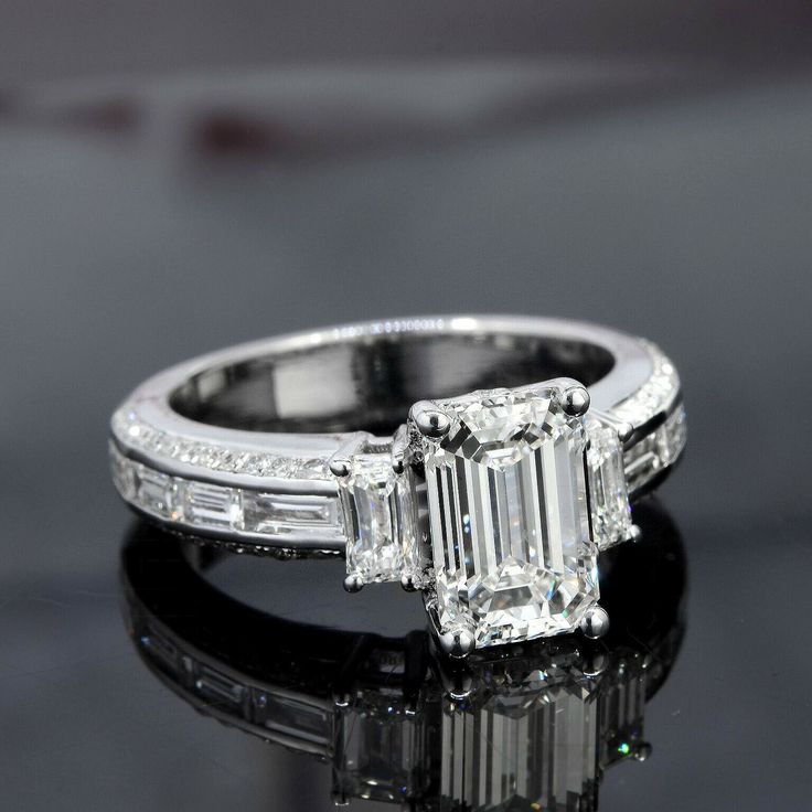 https://youtu.be/2Gt82INoX1E Baguette Cut Emerald Ring With Vvs Clarity, White Gold Vvs Clarity Emerald Ring Baguette Cut, Classic Winston Emerald-cut Engagement Ring With Tapered Baguette Side Stones, Luxury Emerald Ring With Baguette-cut Diamond Accents, Gia Certified Baguette-cut Emerald Platinum Ring, Argentium Silver Jewelry, Wedding Rings Emerald Cut, Emerald Cut Diamond Engagement Ring, Baguette Engagement Ring