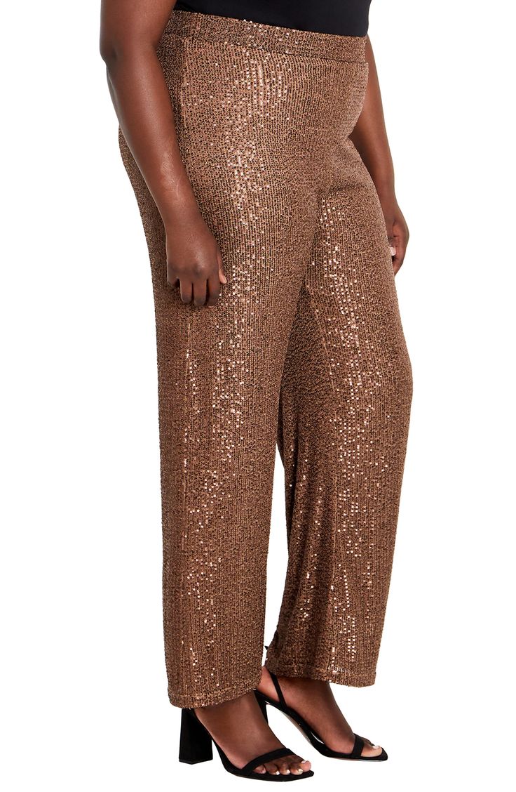 Dazzle on the dance floor all night long in these statement-making wide-leg pants decorated with twinkling sequins. 34" inseam; 14 1/2" leg opening; 14 1/2" front rise Lined 97% polyester, 3% elastane Hand wash, dry flat Imported Elegant Wide Leg Glitter Bottoms, Elegant Wide Leg Glitter Pants, Glamorous Wide Leg Pants For Spring Party, Elegant Glitter Wide Leg Bottoms, Fitted Wide Leg Sequin Pants For Party Season, Wide Leg Pants For Holiday Parties, Glamorous Full-length Wide Leg Pants For Party, Holiday Party Wide Leg Pants, Glamorous Holiday Evening Bottoms