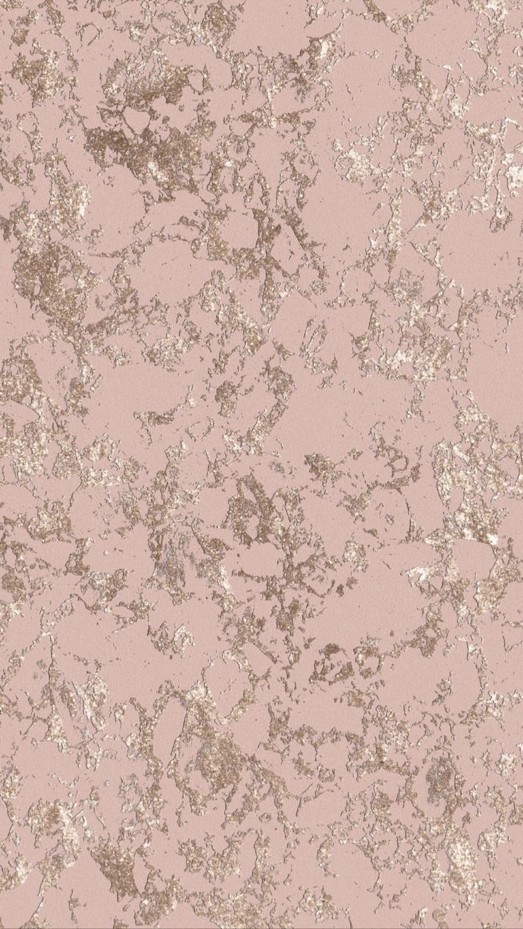 a pink background with gold speckles on it