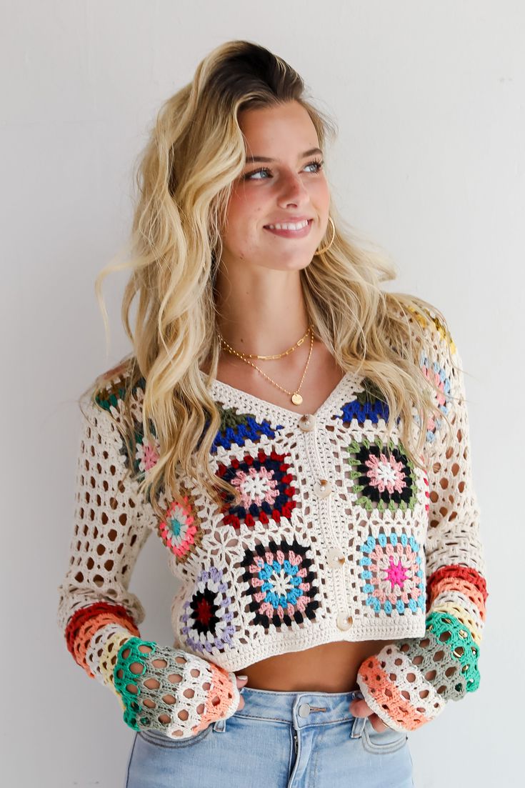 You'll be ready for dreamy days in the sun when you've got the Vibrant Crush Ivory Crochet Knit Top! This top features an array of bright, cheerful colors woven into an intricate crochet knit pattern, creating a unique, eye-catching design that adds texture and personality to any outfit. The button-front style offers versatility and ease of wear, allowing you to style it open over a tank or buttoned up for a more polished look. Crafted from soft, breathable yarn, this top provides comfort while Crochet Knit Top, Intricate Crochet, Brunch Dress, Casual Kimono, 4th Of July Outfits, Rust Dress, Puff Sleeve Dresses, Crochet Tops, Casual Jumpsuit