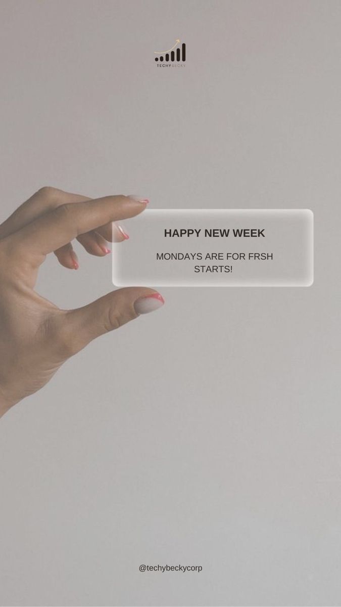 a woman's hand holding a plastic business card that says happy new week