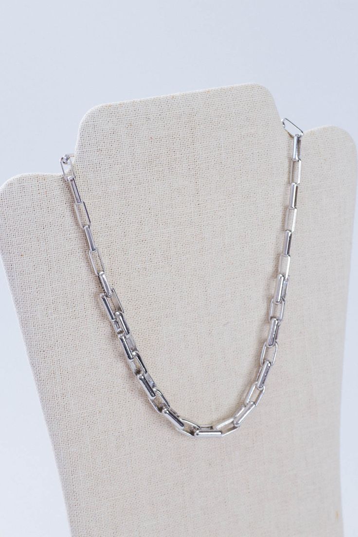 This Rhodium Link Necklace is crafted from silver and features 14" of chain with a secure Claw Clasp Closure for added security. It's the perfect accessory for any occasion. General Info: Fashion jewelry 14" Claw Clasp Closure Imported Multi Layer Necklace Beads, Silver Link Necklace, Silver Bullet, Multi Layer Necklace, Slipper Sandals, Mens Slippers, Link Necklace, Clothing Co, Necklace Silver