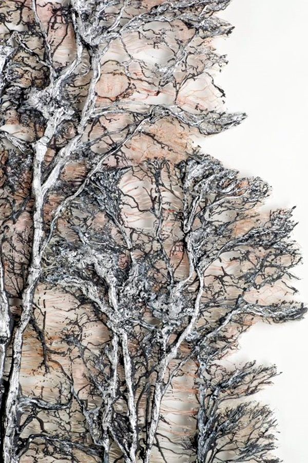 an abstract painting of trees with snow on them