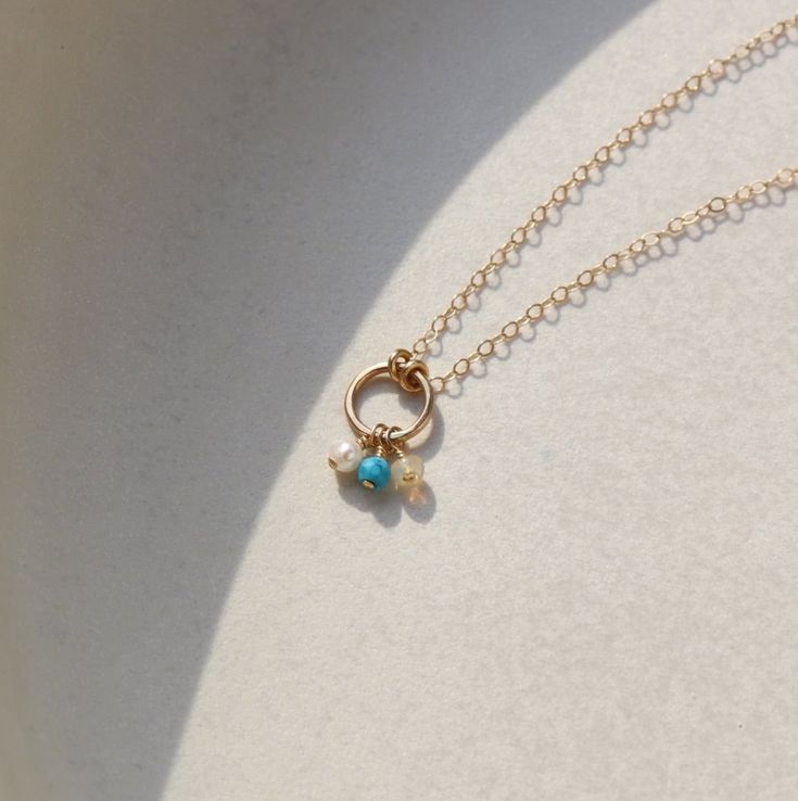 Embrace eternal love with our 14k gold Birthstone Necklace. Featuring a never-ending circle adorned with faceted birthstones, this delicate keepsake is the perfect gift for mothers or grandmothers. A symbol of love that you can cherish forever. Our 14k gold collection comes in a vegan leather box for storing + caring for your jewelry. DETAILS14k Solid GoldAvailable in 16" or 18" Dainty 14k Gold Charm Necklace For May Birthstone, Dainty 14k Gold May Birthstone Charm Necklace, Yellow Gold Birthstone Necklace In Recycled Gold, Delicate May Birthstone Round Pendant, 14k Gold Birthstone Charm Necklace, Yellow Gold Birthstone Necklace With Delicate Chain, Round Yellow Gold Birthstone Necklace With Delicate Chain, Recycled Gold Birthstone Gemstone Necklace For Gift, Recycled Gold Round Birthstone Necklaces