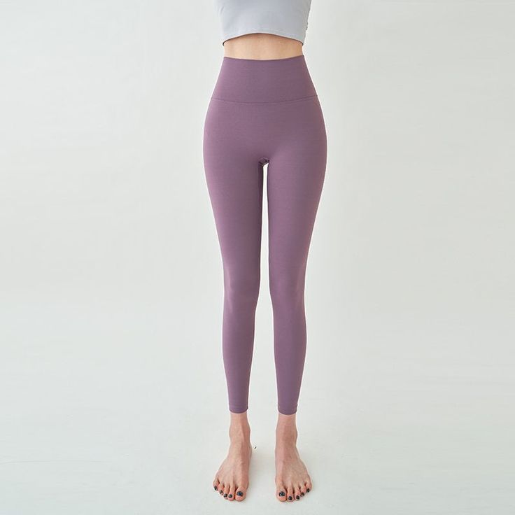 18% spadex/ 82% Polyethylene Model is 5'6" and wearing purple small. Functional Stretch Purple Leggings, Functional Fitted Purple Yoga Pants, Purple High Stretch Yoga Pants For Gym, High Stretch Purple Yoga Pants For Gym, High Stretch Purple Workout Bottoms, Purple Stretch Leggings, Purple High Stretch Full Length Activewear, Purple Compression Yoga Pants For Workout, Compression Purple Yoga Pants For Workout