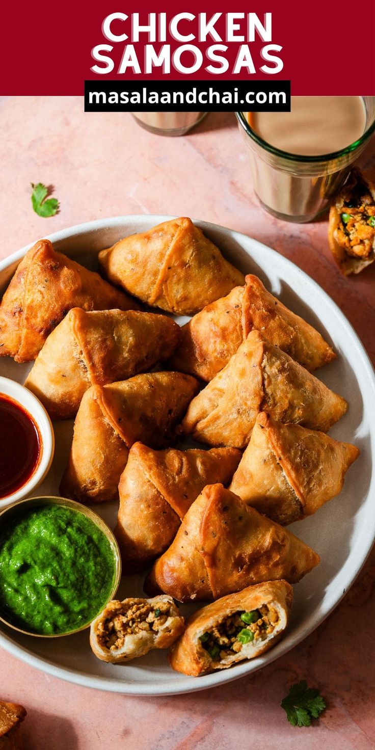 chicken samosas on a plate with dipping sauce