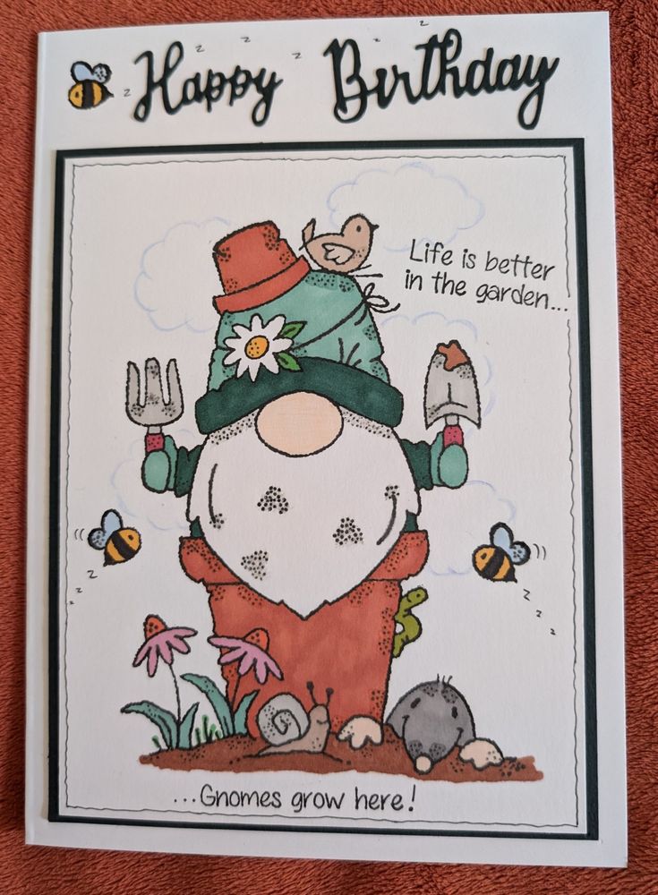 a birthday card with an image of a garden gnome