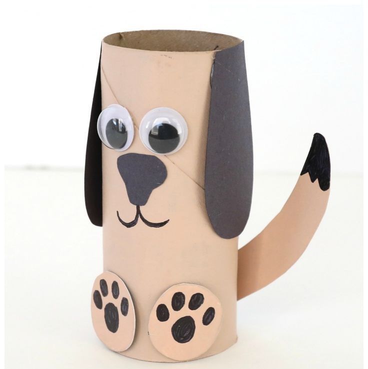 a paper cup with a dog's face and paws painted on the side, sitting in front of a white background