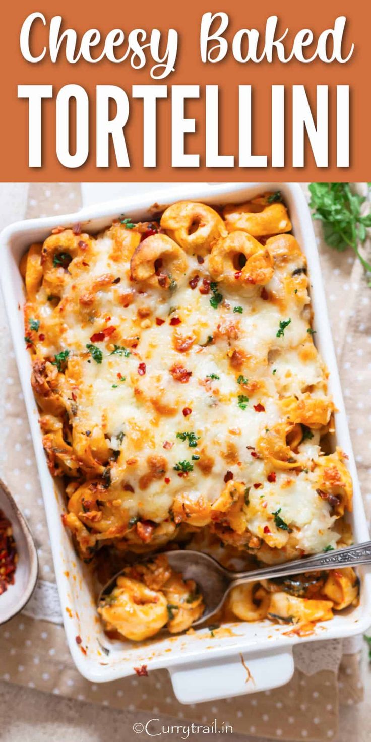 cheesy baked tortelli in a casserole dish with text overlay