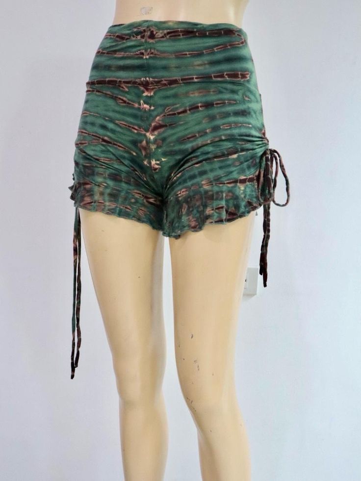 Green Summer Festival Bottoms, Green Festival Bottoms With Built-in Shorts, Green Beachwear Shorts For Festivals, Festival Green Bottoms With Built-in Shorts, Bohemian Stretch Shorts, Bohemian Short Length Bottoms With Drawstring, Beachwear Bottoms With Drawstring For Festival, Bohemian Festival Bottoms With Drawstring, Casual Tie-side Bottoms For Festival