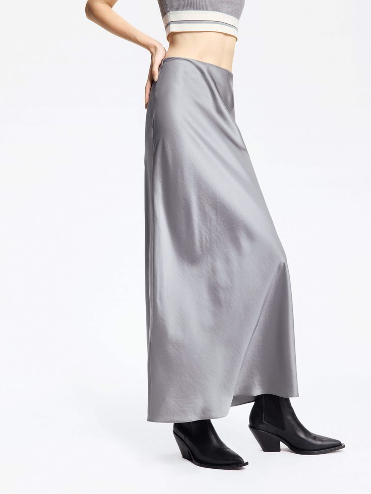 MO&Co. Women's High Rise Satin Maxi Skirt Introducing our satin skirt, crafted from a luxurious blend of acetate and polyester. The high waist and flowing silhouette are effortlessly elegant, while the convenient side zipper allows for easy wear. Create a chic and casual look by pairing it with a tank top or cozy sweater. Features : - High waist, flowy maxi silhouette- Ruched pleated details on the back- Soft and smooth triacetate blend materials Code: MBD1SKT033The back length of size S is 94.5 Satin Maxi Skirt, Satin Maxi, Satin Skirt, Cozy Sweater, Gray Skirt, Cozy Sweaters, Easy Wear, Side Zipper, Casual Looks