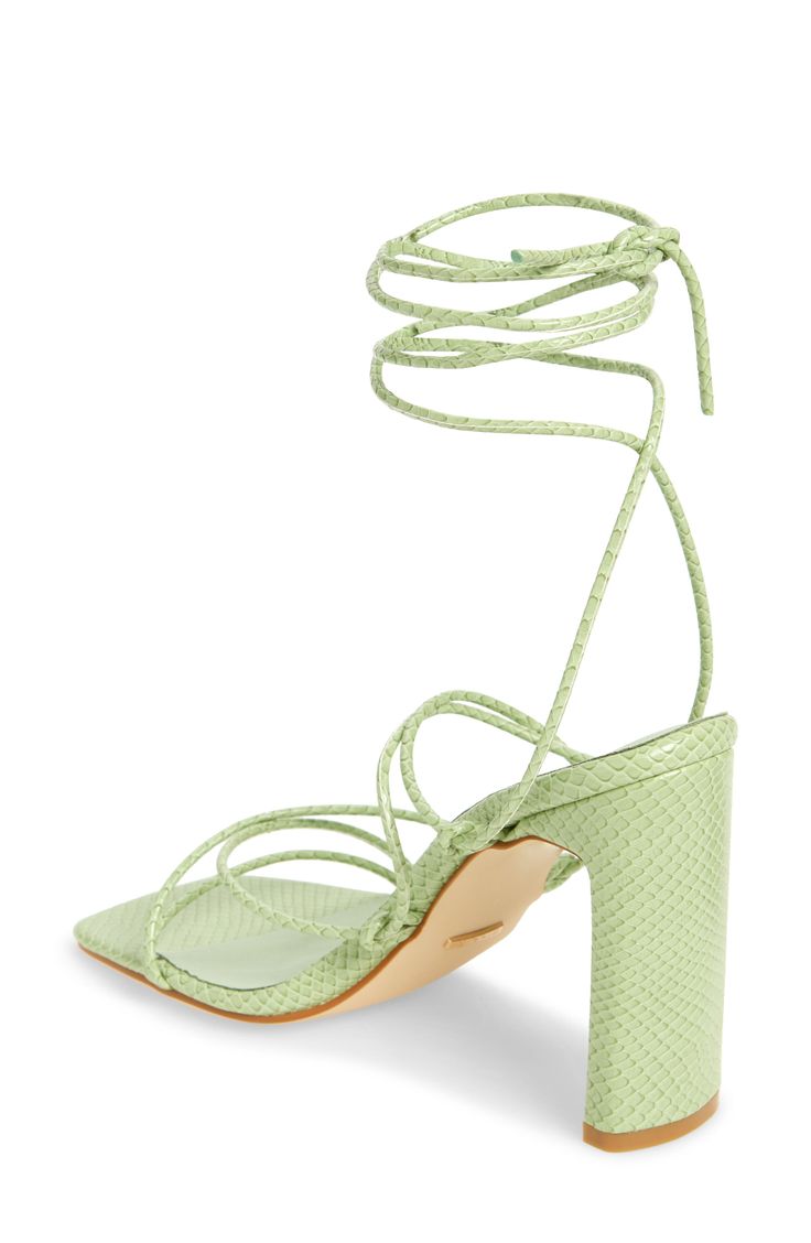 A slender block heel adds a sophisticated flourish to a strappy sandal designed with a squared-open toe. Wraparound ankle strap with tie closure Synthetic upper, lining and sole Imported Fitted Strappy Lace-up Sandals With 4-inch Heel, Summer Strappy T-strap Sandals With Heel Loop, Summer T-strap Strappy Sandals With Heel Loop, Chic Green High Heel Lace-up Sandals, Green Synthetic Sandals With 4-inch Heel, Designer Sandals, Strappy Sandals, Open Toe, Ankle Strap