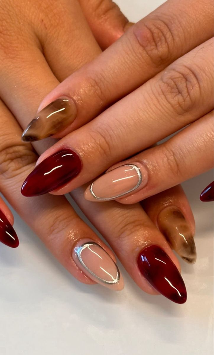 Red Gold Nails Ideas, Red Tortoise Nails, Grunge Nails Aesthetic, Millennial Nails, Autumn 2024 Nails, New Year Nails Red, Maroon Nails With Design, Red And Brown Nails, Artsy Nails Designs