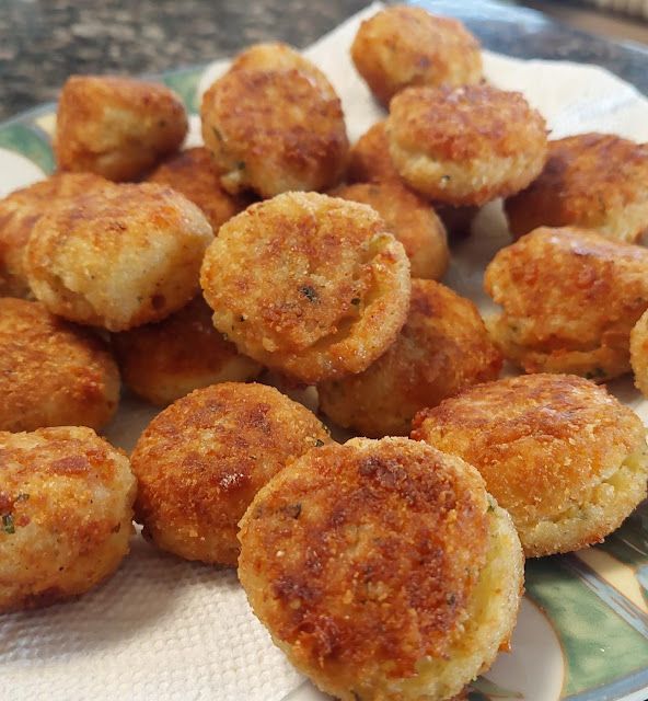 some fried food is on a plate and ready to be eaten