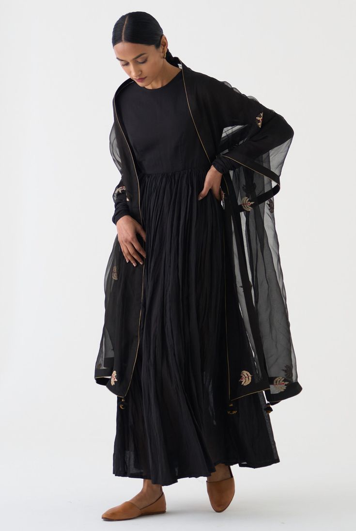 Step into timeless sophistication with this amrita black ghoomar anarkali and dupatta set. Crafted in classic black with intricate detailing, this ensemble exudes elegance and grace. Perfect for making a statement at any special occasion, it's a versatile addition to your wardrobe, capturing the essence of refined style. Chanderi Anarkali, Indian Designer Suits, Gaun Fashion, Casual Indian Fashion, Salwar Kamiz, Traditional Indian Outfits, Kurti Designs Party Wear, Ethnic Outfits, Designer Party Wear Dresses