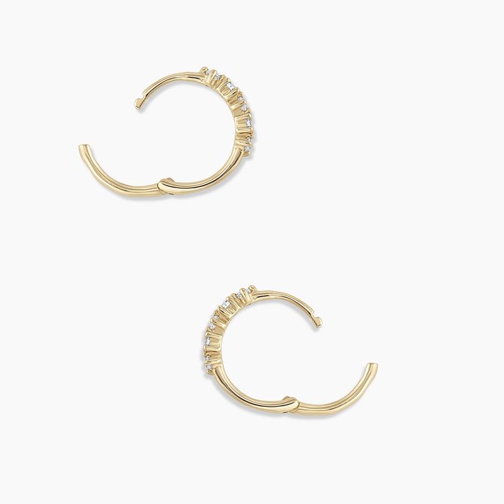 Description A cluster of diamonds various shapes creates a beautiful, eye-catching design on these 14k gold huggie hoop earrings. We love the way these earrings look in first piercings. Make it a single Product Details 1.29 total carat weight Ten 1.5 mm GI SI1- I1 diamonds 14k solid gold 12 mm profile diameter and 1.2 mm wide Hinge closure Minimalist Small Hoop Earrings With Brilliant Cut, White Aura, Earrings Stacking, Gold Huggie Hoop Earrings, Black Labradorite, Orange Agate, Yellow Opal, Iridescent Crystal, Beautiful Eye